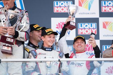 BATHURST, AUSTRALIA - FEBRUARY 04: Grant Denyer celebrates on the podium during the 2018 Bathurst 12 Hour Race at Mount Panorama on February 4, 2018 in Bathurst, Australia. (Photo by Daniel Kalisz/Getty Images)