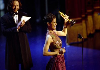 American actress Halle Berry accepts the Academy Award for Best Actress for her performance in "Monster's Ball", at the 74th Annual Academy Awards in 2002. 