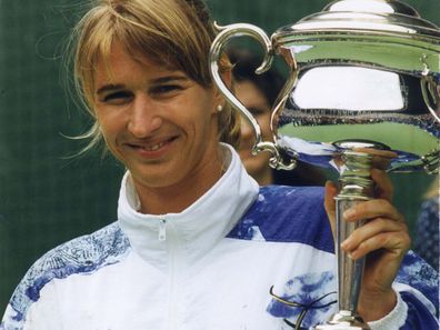 Steffi Graf holding the Australian Open Cup