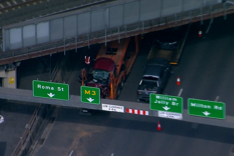 Truck trapped under Brisbane bridge