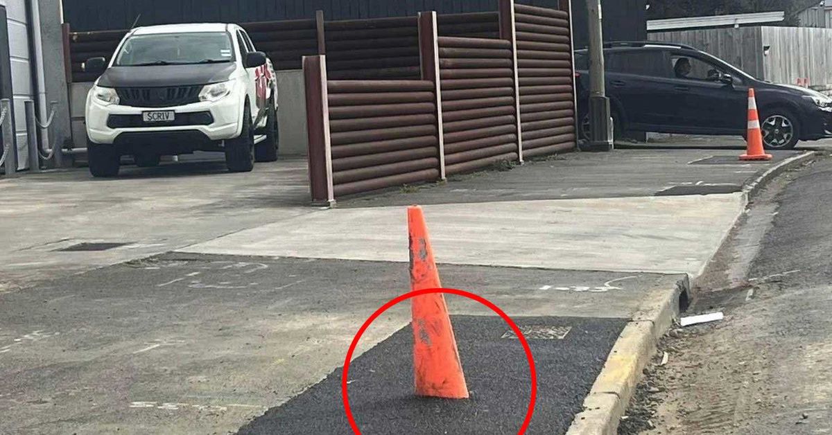 Confusion after New Zealand council asphalts a road cone into the footpath