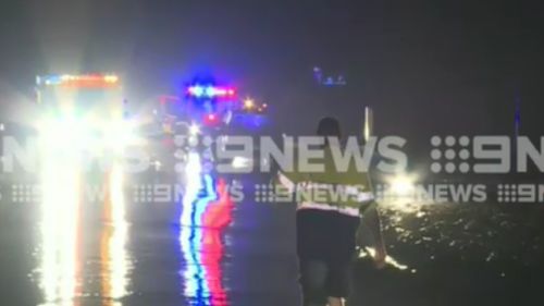 Three people were rescued from two cars in the Hervey Bay region last night. (9NEWS)