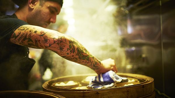 Cook preparing buns in the kitchen (Hawker Hall)