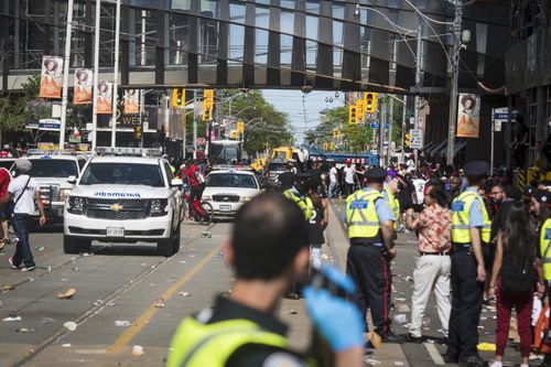 The street was blocked off for a brief period of time. (Tijana Martin/The Canadian Press via AP)