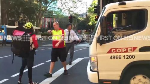 Neither the cabbie or the cyclist were willing to back down. (9NEWS)