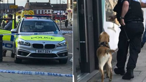 Police have cordoned off the Southgate tube station after reports of the explosion (left) and sniffer dogs have been called in (right). Pictures: Supplied