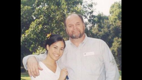 A young Meghan Markle with her father, Thomas.