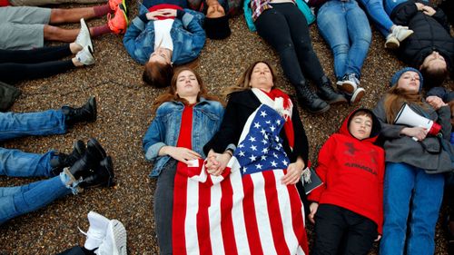 Anti-gun protesters demonstrate in Washington. (AP).