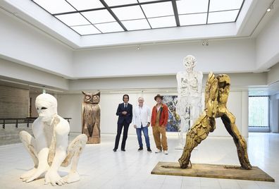  British artist Thomas Houseago, centre, poses with US actor Brad Pitt, centre right and Australian musician Nick Cave, September 2022