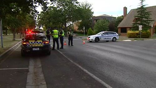 Melbourne woman charged after cyclist left critical in alleged hit-and-run