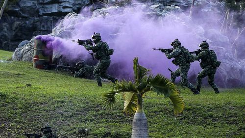 Taiwanese soldiers take part in a military drill.