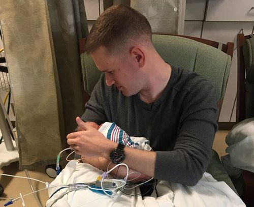 Army dad was able to see his new arrivals four days later. (Adventist Hinsdale Hospital/ Facebook)