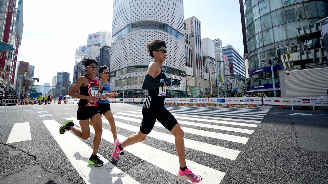 Toshiki Sadakata #156 of Japan leads the chase group during the Tokyo Marathon 
