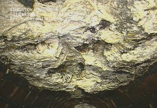 In this undated image released by Thames Water company, showing part of a 15 tonne lump of fat and other debris coagulated inside a main London city sewer. (AAP)