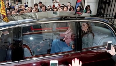 Queen Elizabeth and Kate Middleton share a blanket