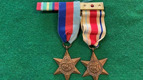 The medals were stolen from Downs' home in 1969.