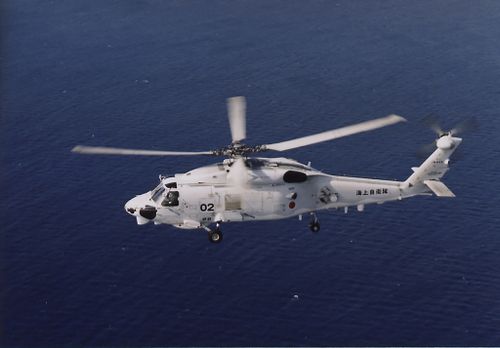 This undated photo released by and taken from the official website of the Japan Maritime Self-Defense Force, shows a SH-60K chopper