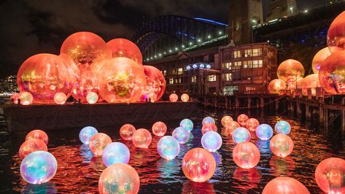 Colourful balls across Darling Harbour for Vivid 2022.