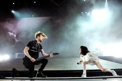 INDIO, CALIFORNIA - APRIL 16: (L) FINNEAS and Billie Eilish perform on stage at the Coachella Stage during the Coachella Valley Music And Arts Festival 2022 on April 16, 2022 in Indio, California.  (Photo by Kevin Mazur/Getty Images for ABA)