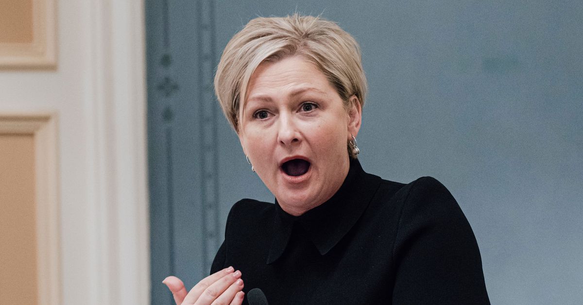 Community recovery minister on holiday in Africa during Queensland floods