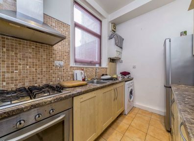 A confusing photo of a one-bedroom sneaks into the advert for a two-bedroom flat in upmarket London. 