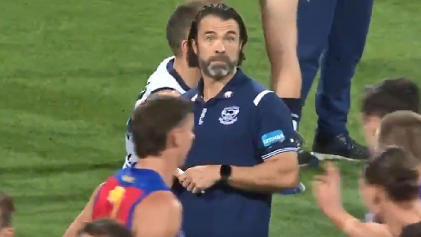 'They weren't paying me compliments': Chris Scott opens up on testy exchange with Lions huddle