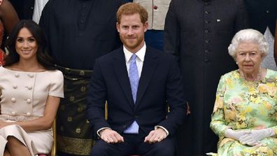 The Duke and Duchess of Sussex pose with the Queen at the Young Leaders Awards in January 2020.