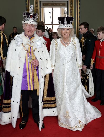 King Charles III and Queen Camilla pose and smile after their Coronation, at Buckingham Palace on May 06, 2023 in London, England. 
