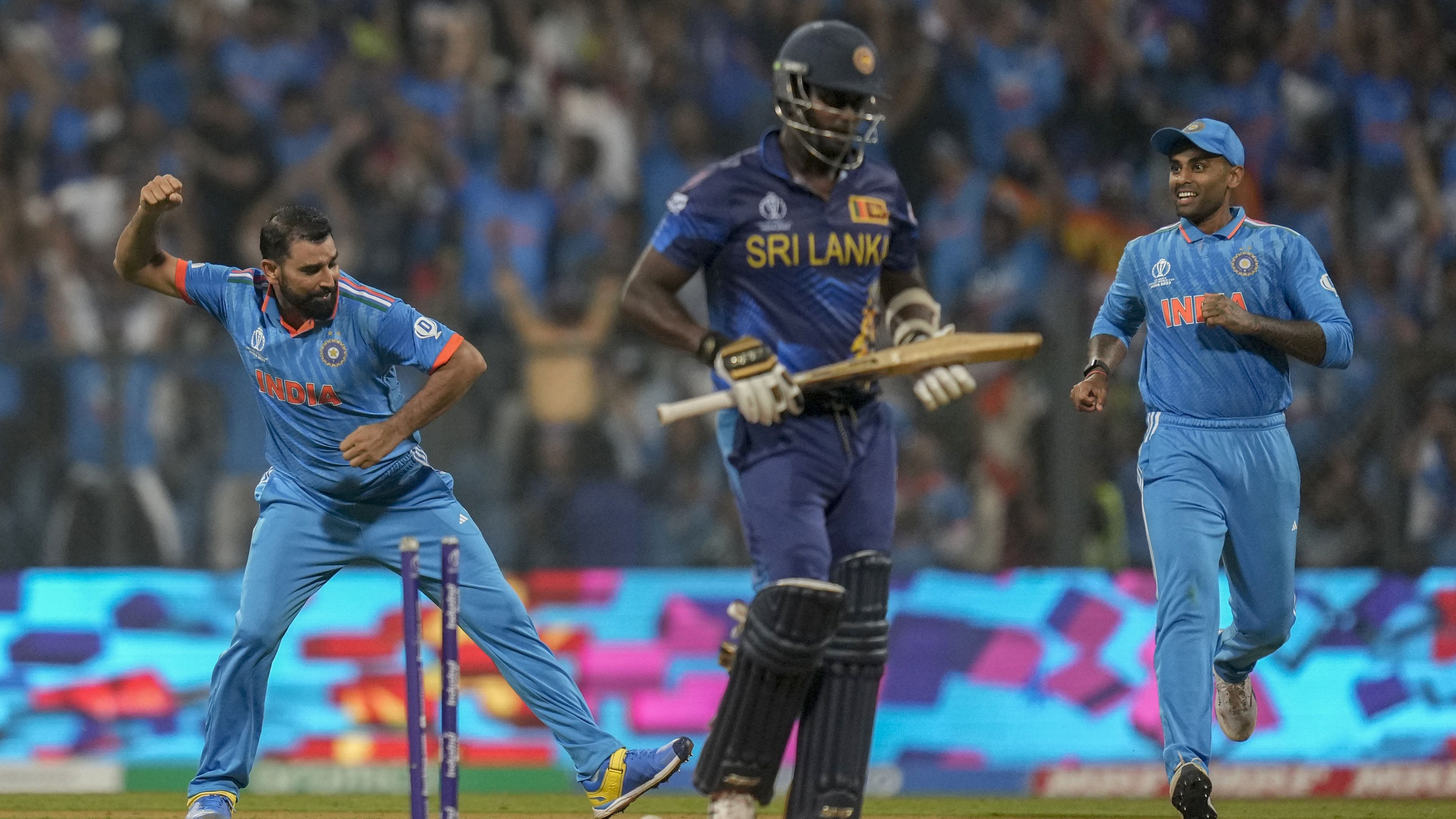 India&#x27;s Mohammed Shami celebrates the dismissal of Sri Lanka&#x27;s Angelo Mathews.