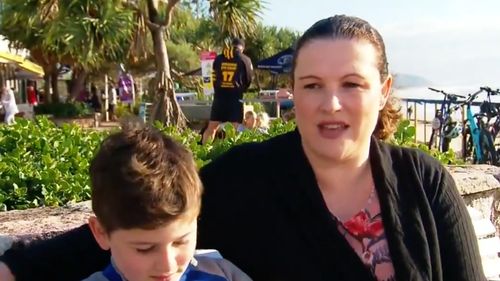 Fiona McDonald and son Hamish were swimming between the flags at Alexandra Headland beach on the Sunshine Coast before the pair were in peril. 