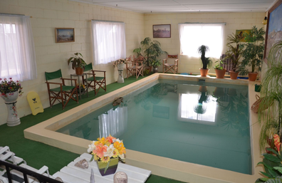 Property for sale in Coober Pedy, South Australia, with an indoor swimming pool. 