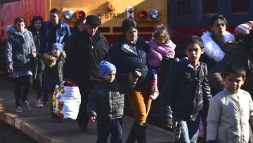 Refugees fleeing conflict from neighbouring Ukraine arrive to Zahony, Hungary, Sunday, Feb. 27, 2022. 