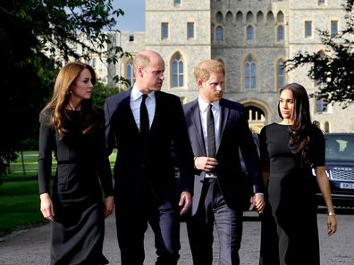 Catherine, Princess of Wales, Prince William, Prince of Wales, Prince Harry, Duke of Sussex, and Meghan, Duchess of Sussex on the long Walk at Windsor Castle arrive to view flowers and tributes to HM Queen Elizabeth on September 10, 2022 in Windsor, England. Crowds have gathered and tributes left at the gates of Windsor Castle to Queen Elizabeth II, who died at Balmoral Castle on 8 September, 2022. (Photo by Chris Jackson - WPA Pool/Getty Images)