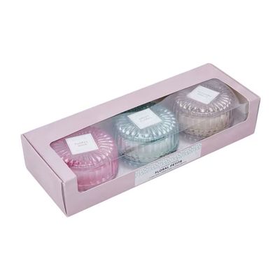 Three-pack floral petite fragrant candles: $15