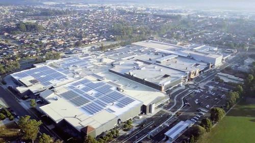 A sea of solar panels is seen on the roof of its Wetherill Park shopping centre in NSW. (9NEWS)