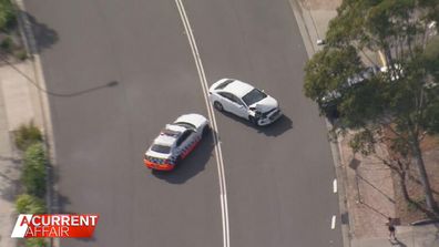 The suspected stolen car, with Queensland number plates, managed to dodge police as they swarmed in Sydney's south-west.