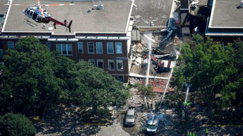 The gas blast caused part of the school to collapse. (AP)