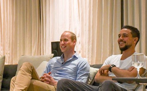 Prince William and the Crown Prince of Jordan sit down to watch England and Panama during their World Cup clash. Picture: Kensington Palace/Twitter