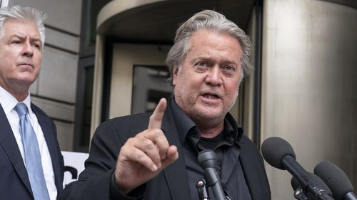 Steve Bannon speaks to the media as he departs the federal court in Washington, Thursday, July 21, 2022. Bannon was brought to trial on a pair of federal charges for criminal contempt of Congress after refusing to cooperate with the House committee investigating the U.S. Capitol insurrection on Jan. 6, 2021. (AP Photo/Jose Luis Magana)