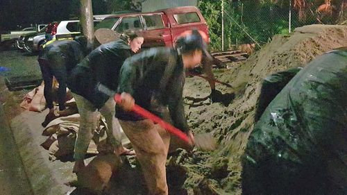 Community members filling up sandbags in Port Macquarie