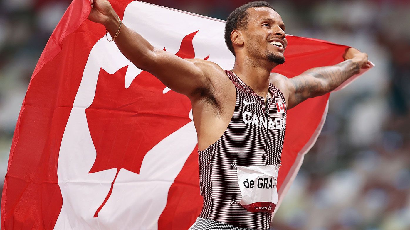 Andre De Grasse of Team Canada celebrates after winning the gold medal in the Men&#x27;s 200m Final on day twelve of the Tokyo Olympic Games.