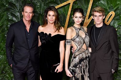 Rande Gerber and Cindy Crawford wiht kids Kaia and Presley at the Fashion Awards 2018 in partnership with Swarovski at Royal Albert Hall on December 10, 2018 in London, England. 