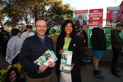 MELBOURNE, AUSTRALIA - MAY 03: Adam Bandt, leader of the Greens and Samantha Ratnam, Candidate for Wills pose in the seat of Wills at Brunswick East Primary School on May 03, 2025 in Melbourne, Australia. Australians headed to the polls on Saturday for the 2025 federal election, where all 150 seats in the House of Representatives and 40 of 76 Senate seats are up for grabs. This election is especially consequential due to a tightly contested race, with cost-of-living pressures, affordable housing