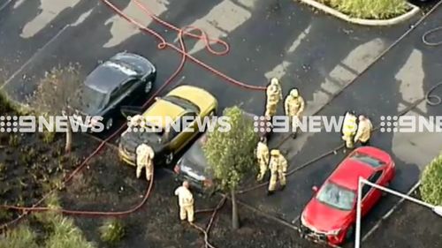 Cars damaged in powerful grassfire outside Melbourne shopping centre