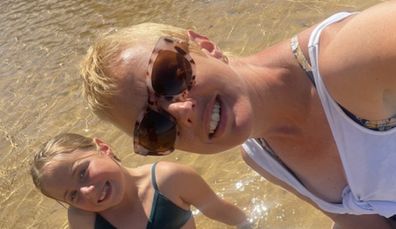 Dennielle cancer bushfires Good360 with daughter at beach