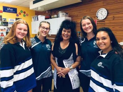 Siena Stubbs (right) with fellow students in her high school years.