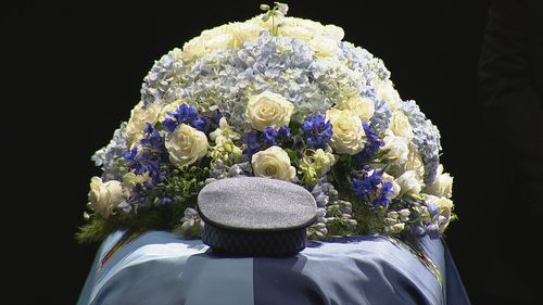 The coffins of Constables Rachel McCrow and Matthew Arnold at the memorial.