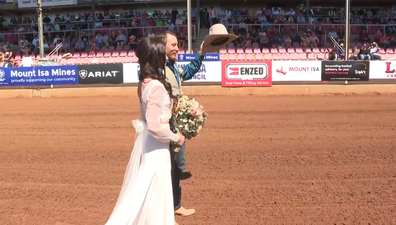 Couple get married at Mt Isa Rodeo.