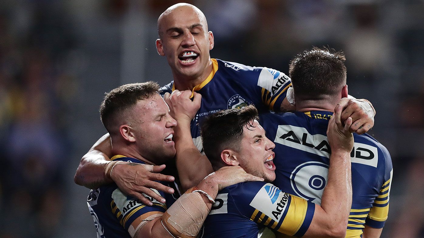 Reed Mahoney of the Eels celebrates scoring a try with team mates during the round 1 NRL match between the Parramatta Eels and the Canterbury Bulldogs