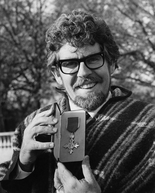 Australian entertainer Rolf Harris outside Buckingham Palace in London, after receiving his OBE, 22nd November 1977. 